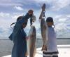 rocky and dominick redfish.jpg